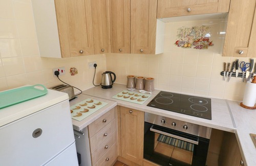 Oxwich House | BAYVIEW BUNGALOW, pet friendly, with a garden in Reynoldston