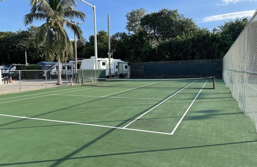 Key Largo RV Rental | Bayview RV/Camper with private boat dock looking over sunset