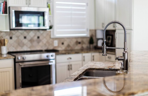 Villa Primera House | Beach Bungalow Steps from Pensacola Beach and Sound with Salt water heated pool