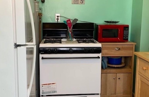 Cottage Line Apartment | Beach Side Studio #4 1 Bedroom Apts by RedAwning