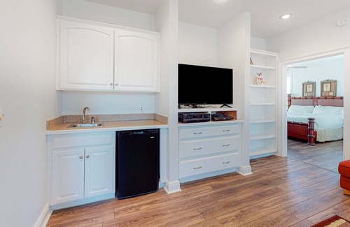 Treasure Beach Village House | Beach view dog-friendly home with a pool, tennis, fireplace, washer/dryer, grill