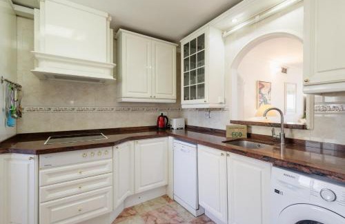 Torremolinos Apartment | Beachfront apartment with panoramic sea views, private parking, swimming pools and mini golf