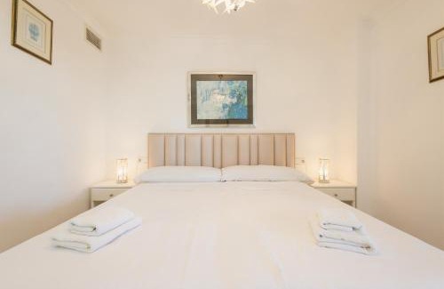 Torremolinos Apartment | Beachfront apartment with panoramic sea views, private parking, swimming pools and mini golf