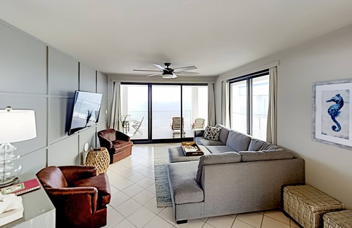 Orange Beach Condo | Beachfront corner condo with pools, a hot tub, tennis, & sauna