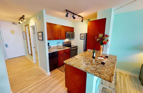Historic Lahaina Front Street Condo | Beachfront Paradise, Stunning Views, Condo with AC, Steps to the beach!