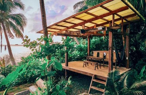 Catangnan House | Beachfront Private Bungalow