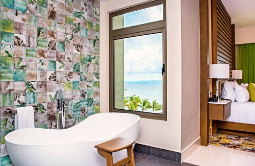 Playa Mujeres Resort | Beachfront Residence with Caribbean Ocean Views & Private Jacuzzi