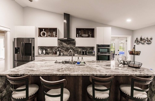 Nokomis House | Beautiful 4-bedroom House in Charming Location - Heated Pool - Near Beach