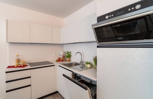 Lignano Sabbiadoro Apartment | Beautiful apartment for 4 people with A/C, WIFI, TV and balcony
