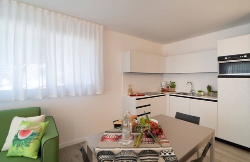 Lignano Sabbiadoro Apartment | Beautiful apartment for 4 people with A/C, WIFI, TV and balcony