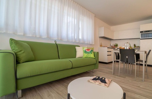 Lignano Sabbiadoro Apartment | Beautiful apartment for 4 people with A/C, WIFI, TV and balcony