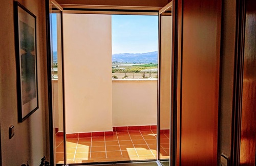 Caleta de Velez Apartment | Beautiful apartment with sea view, pool and golf course