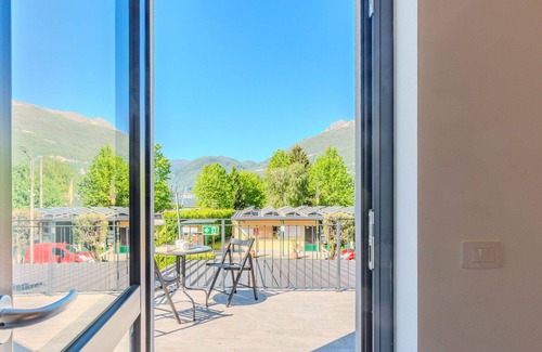 Dervio Apartment | Beautiful apartment for 4 people with WIFI, pool, A/C, TV, patio and panoramic view
