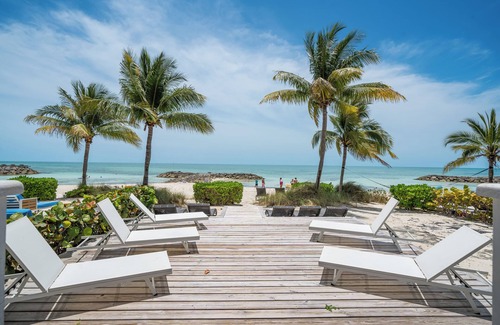 Nassau House | Beautiful Beachfront 4-bedroom Townhome