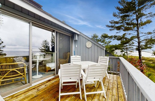 Glen Arbor House | Beautiful beachfront townhouse with deck, water views, community firepit
