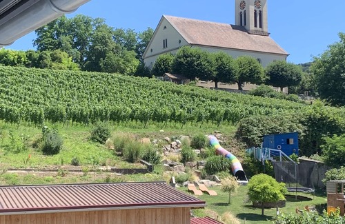 Auggen Apartment | Beautiful, bright vacation apartment with a view of the vineyards and church