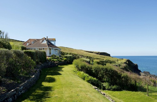 Gunwalloe House | Beautiful Cliff Top Cornish House with outstanding sea views overlooking beach