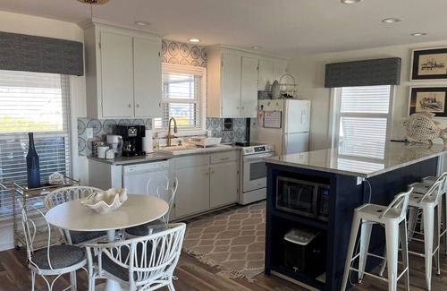 Emerald Isle Cottage | Beautiful cottage w/ocean views - steps away from the beach! Dog Friendly!