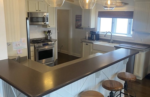 Elkhorn House | Beautiful lakefront view on Lauderdale Lakes only steps away from golf course.