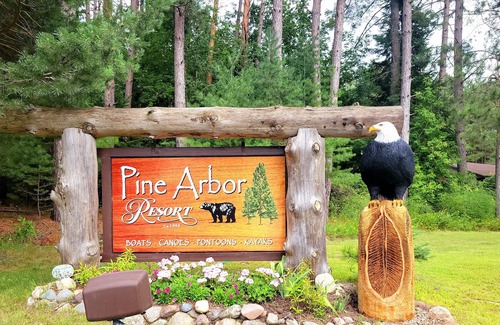 Arbor Vitae Cabin | Beautiful Northwoods Cabin with Large Deck, Dock, Community Firepit & kayaks