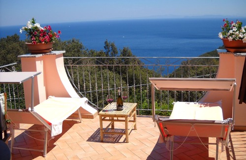 Aia House | Beautiful semi-detached house with views of sky, woods and sea