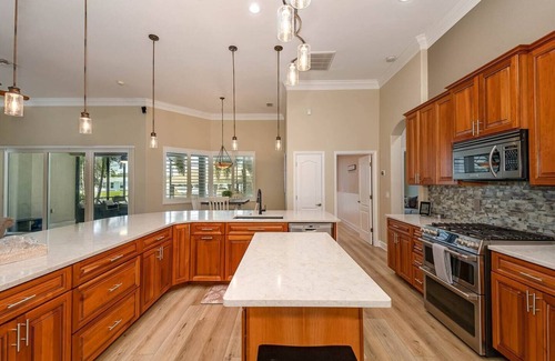 River Isles House | Beautiful waterfront 5 BR home with pool, kayaks