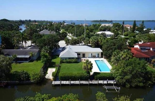Vero Beach Cottage | Beautiful Waterfront Home with Dock and Ramp