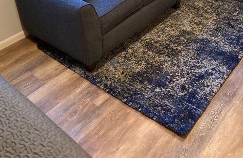 Ludington Apartment | Beautiful wooded area right outside your door and a 5 minute walk to Hamlin Lake