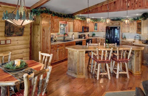 Sylvan Shores Cabin | Beaver Lake Waterfront Homestead House with Hot Tub ON Beaver Lake w/Dock/Slips. Rate based on 4 people.
