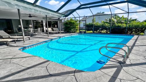 Fort Myers Villa | Belle Paradise heated Pool boating Oasis of calm