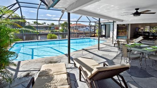 Fort Myers Villa | Belle Paradise heated Pool boating Oasis of calm