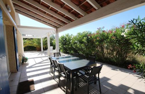 Portiragnes-Plage Villa | Belle villa climatisée, wifi, 3 chambres grande terrasse vue réserve naturelle dans résidence sécurisée avec piscine commune 800m de la mer Un vrai Havre de Paix LRCS107