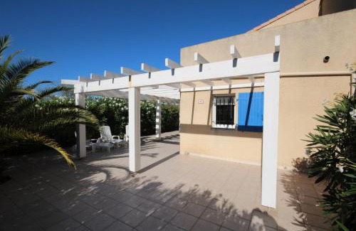 Portiragnes-Plage Villa | Belle villa climatisée, wifi, 3 chambres grande terrasse vue réserve naturelle dans résidence sécurisée avec piscine commune 800m de la mer Un vrai Havre de Paix LRCS107