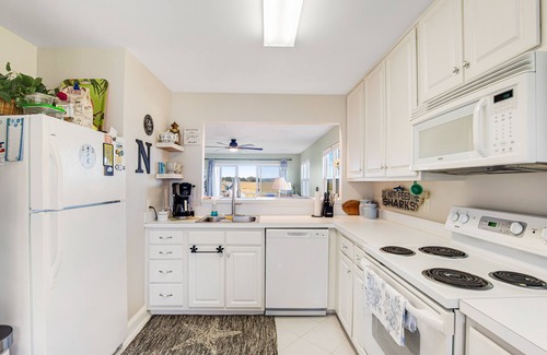 Ocean View Condo | Bethany Bay condo with pool, fireplace, screened porch & AC