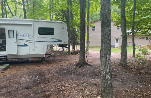 Beulah House | Betsie - Excellent 35Ft RV Camper in the Woods Fire Pit & Hot Tub Access