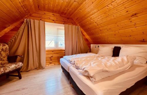 Rewal Cabin | Biale Domki Paula Rewal - Domki z klimatyzacja, w obiekcie Jacuzzi i darmowe Wifi!