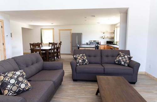 Decorah Villa | Bluffside Gardens Oak Series 11 Person Cabin Unit 6