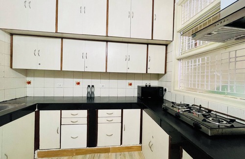 Sushant Lok Apartment | BluO 1BHK - DLF Galleria | Balcony, Suite