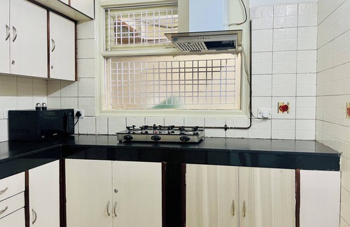 Sushant Lok Apartment | BluO 1BHK - DLF Galleria | Balcony, Suite