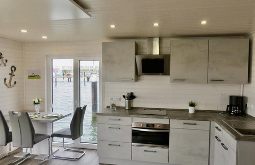 Ostholstein Boat Rental | Boat 'Bali' with Sea View, Private Terrace and Wi-Fi