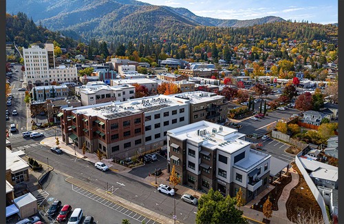 Historic Railroad District Condo | BookStayHop - Plaza North Penthouse~ Mountain Views & Gourmet Outdoor Kitchen