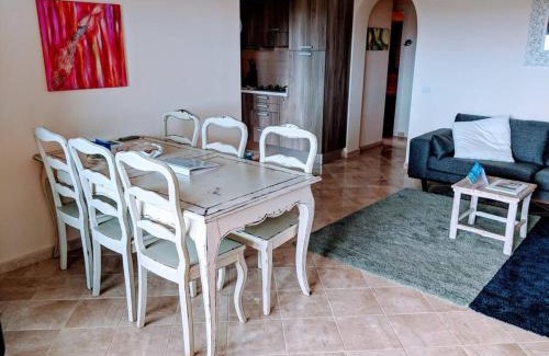 Porto Pozzo Apartment | Boutique Apartment no 24 with Sea View and large Pool