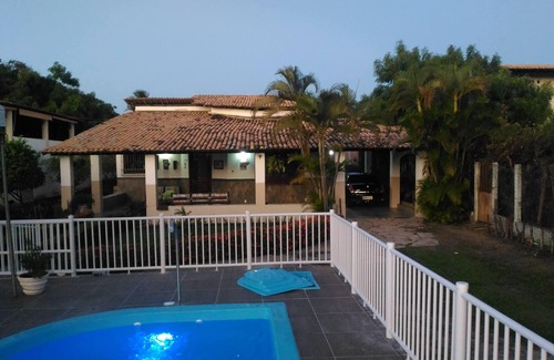 Aruanda House | House in farmhouse with all structure of leisure and comfort