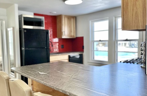 Oskaloosa Condo | Brand New Stylish Condo near Trails & Downtown