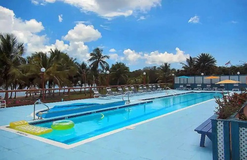 Estate Golden Rock Condo | Breathtaking Ocean Views Condo with Private Beach Access.