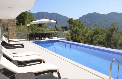 Ortaca Villa | Breathtaking views from the infinity pool of the famous Iztuzu beach view.