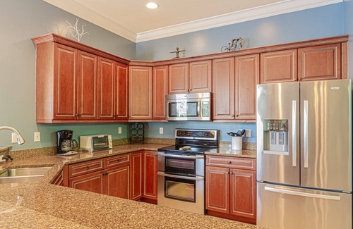 Central Naples House | Briarwood home w/heated pool/spa-outdoor kitchen-retractable awning-private lake view