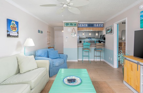 Villa Sabine Condo | Bright and Fun Beach Themed Condo - On Little Sabine Bay - Sand Dollar W107