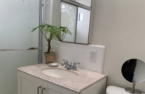 The Strand Apartment | Bright Beach Apartment in Heart of Downtown MB