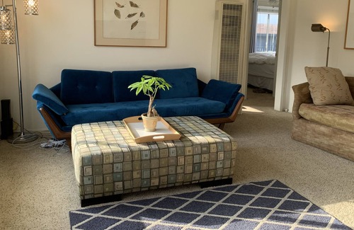The Strand Apartment | Bright Beach Apartment in Heart of Downtown MB